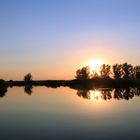 Sonnenuntergang während abendlicher Bootstour auf der Peene