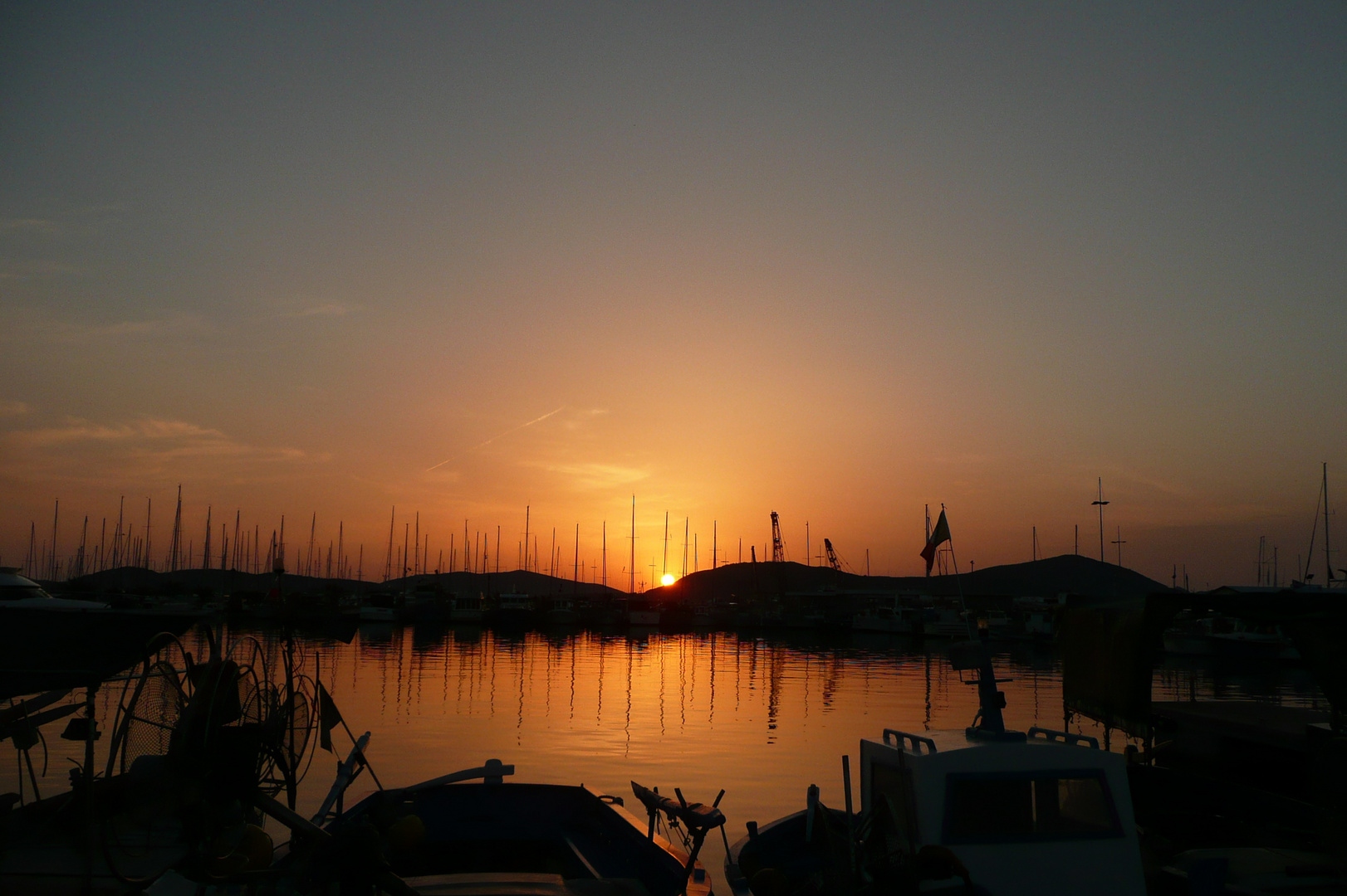 Sonnenuntergangsstimmung im Hafen von Alghero