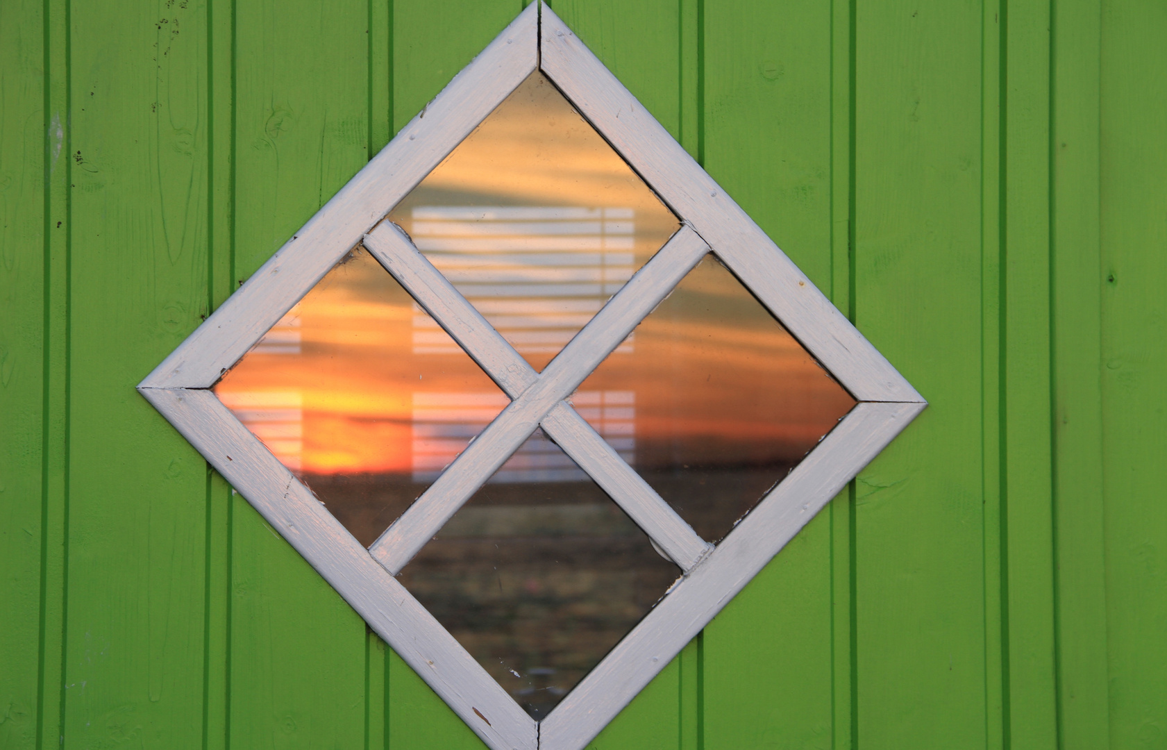 Sonnenuntergnag in grüner Hütte