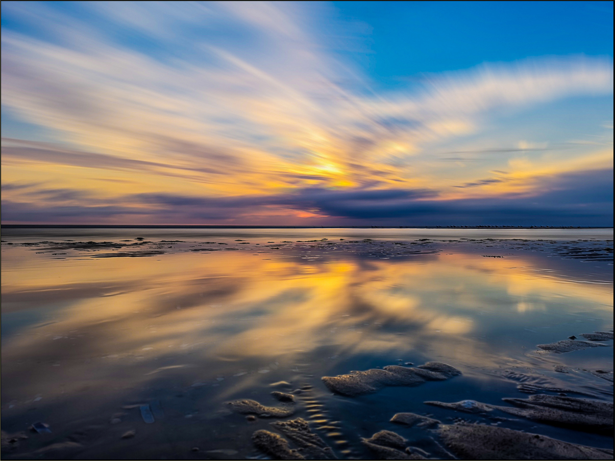 Sonneuntergang über dem Wattenmeer