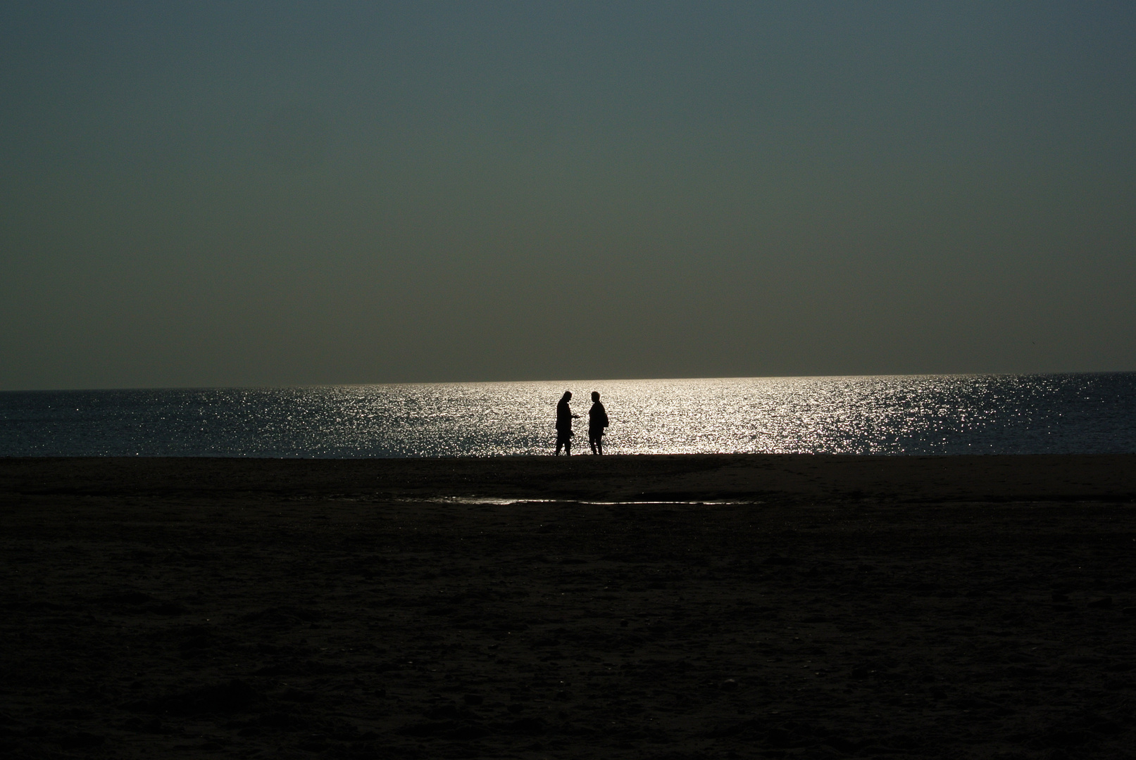 Spaziergänger am Strand