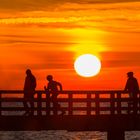 Spaziergänger auf der Seebrücke