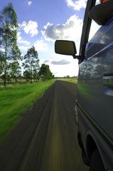 speeding on dirt road...