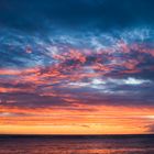 Spektakularer Sonnenuntergang uber dem Indischen Ozean, Flic En Flac Beach, Mauritius