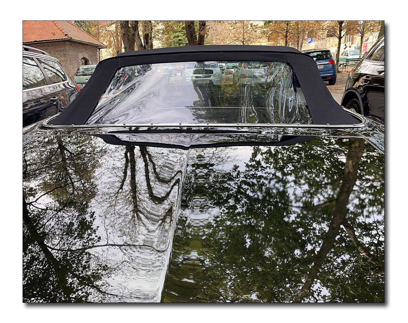 spiegelung am cadellac de ville convertible - baujahr  1969