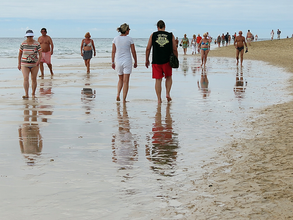 Spiegelung am Strand