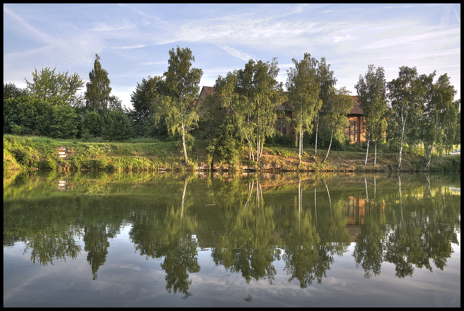 Spiegelung am Weiher