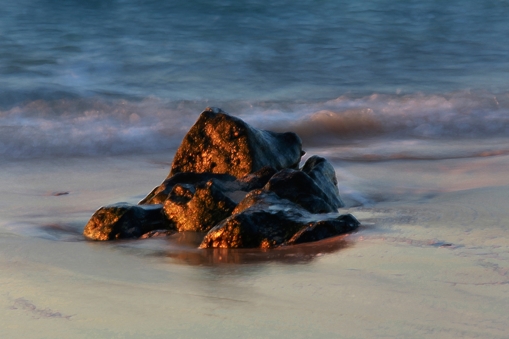 Spiegelung im feuchten Sand