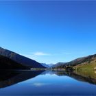 Spiegelung in der Morgendämmerung am Davoser See