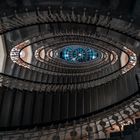 Spiral staircase with chandeliers