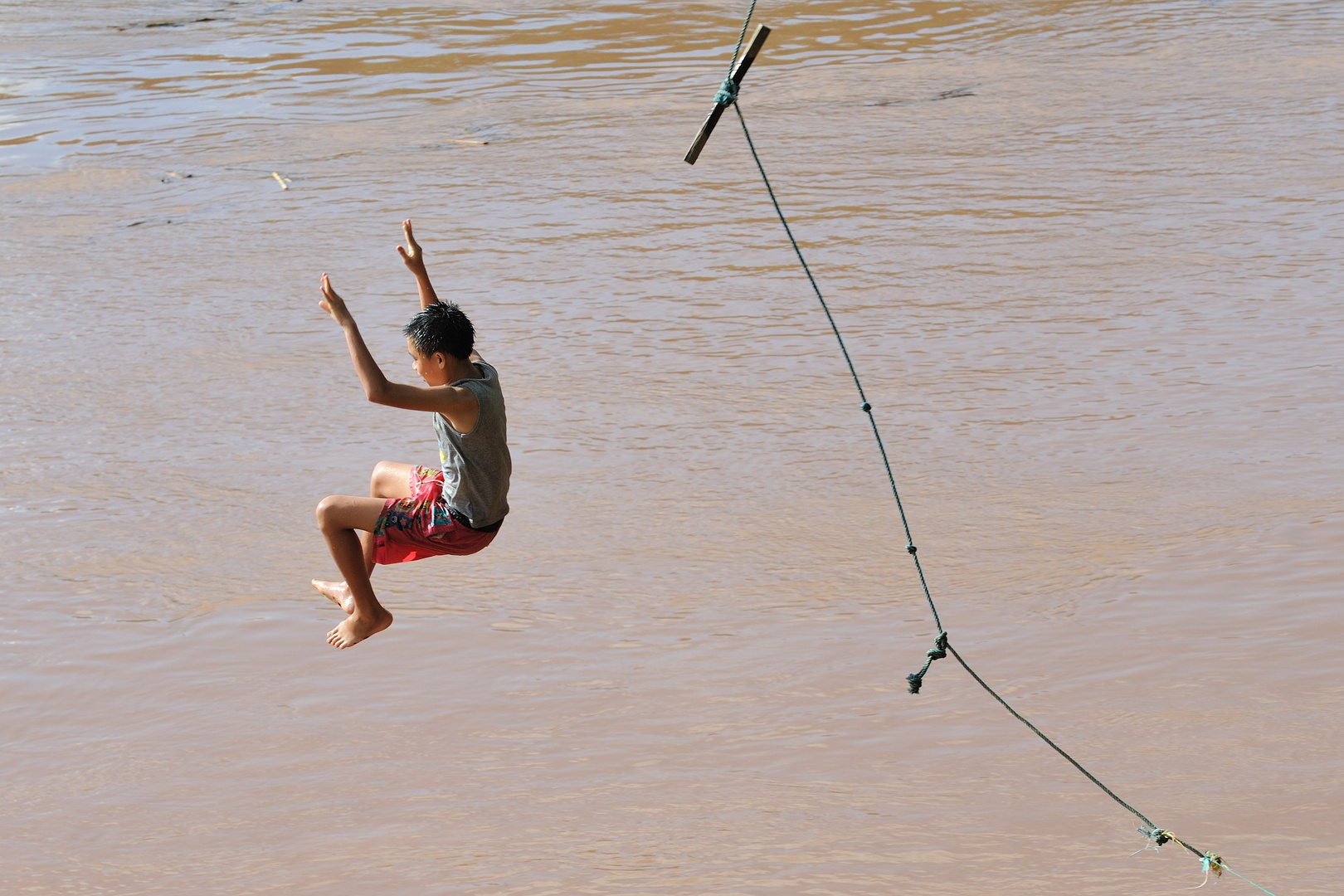 Sprung in den Mekong
