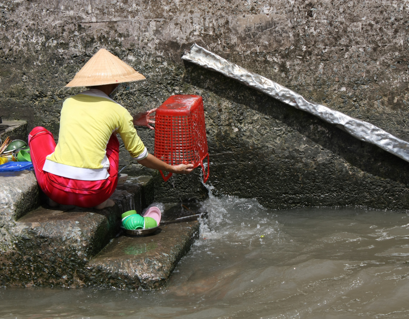 Spülen im Mekong