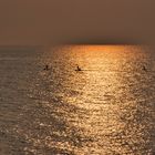 stand up paddlings am Abend auf der Ostsee