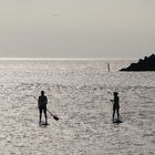 Standup-paddler are doing it standing up!