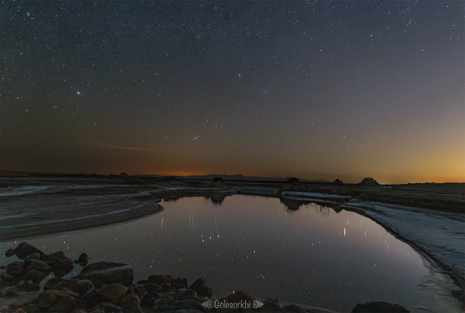 Stars and their image on the pond