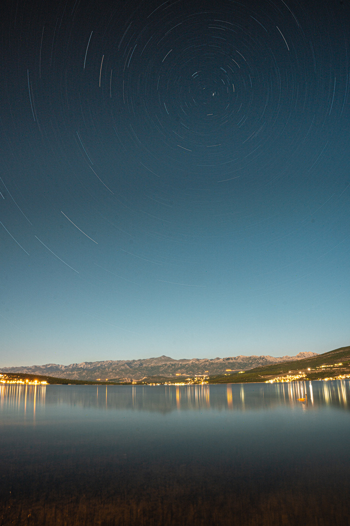 Stars over a lake