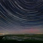 Startrail über dem Wattenmeer