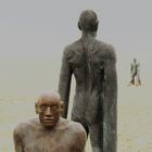 Statues walking on the beach De Panne