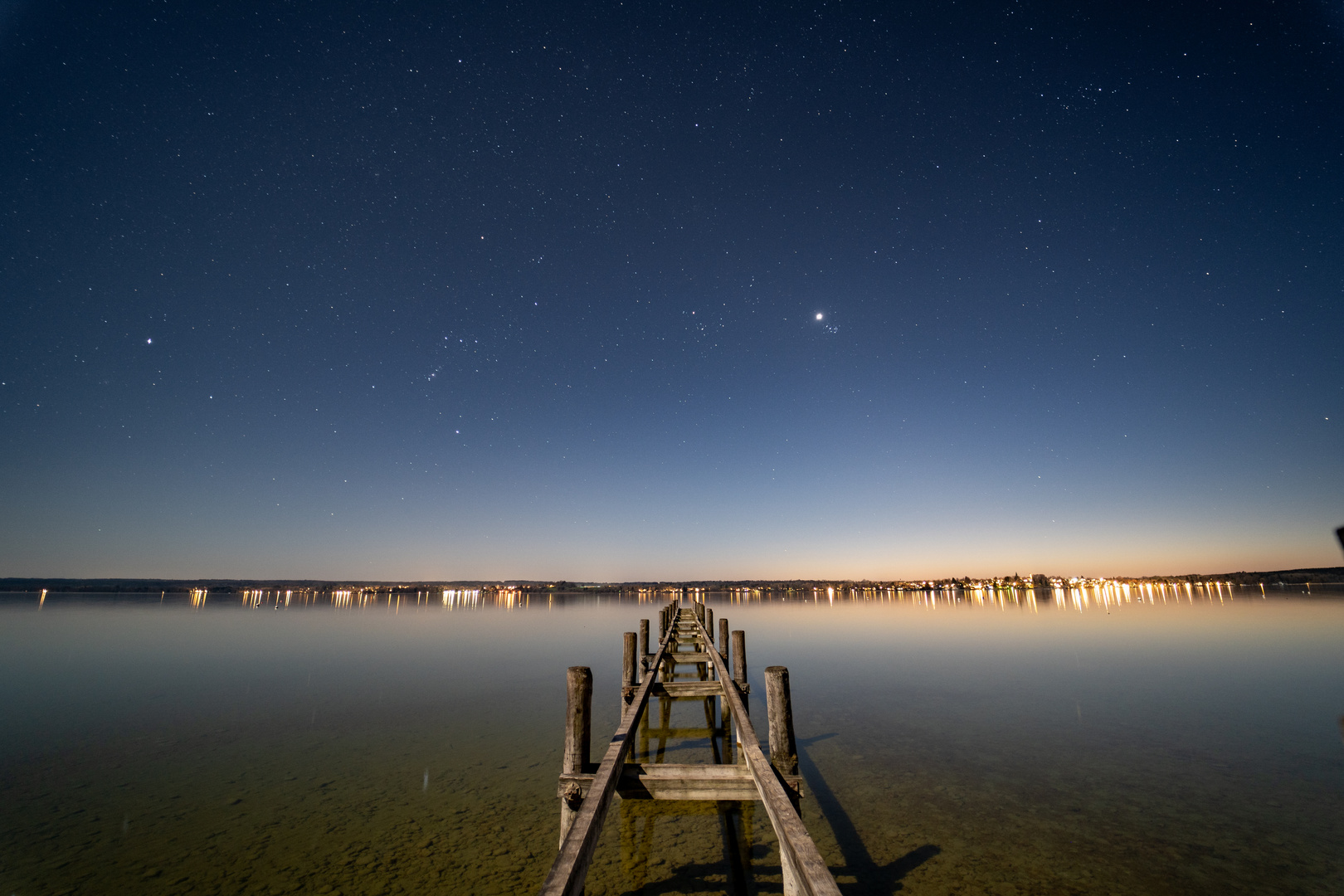 Steg bei Vollmond am Ammersee