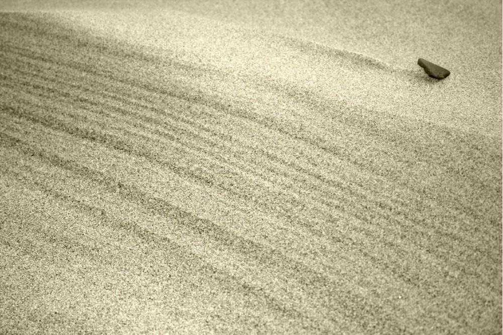 Stein im Sand