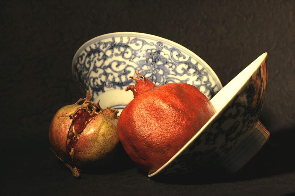 Still life with pomegranate and chinese cup