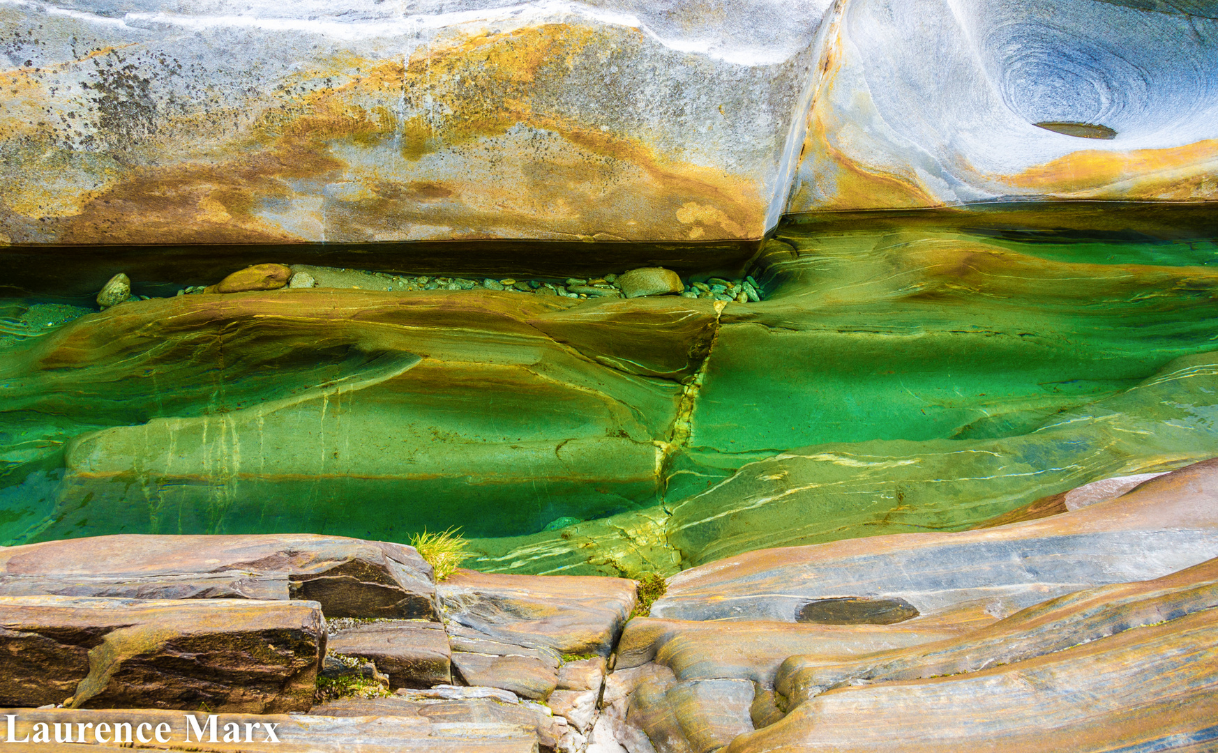 Stones and green water