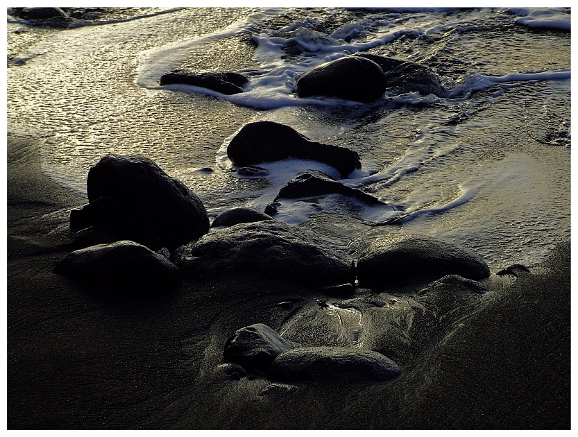 -- stones -- black -- sand --