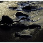 -- stones -- black -- sand --