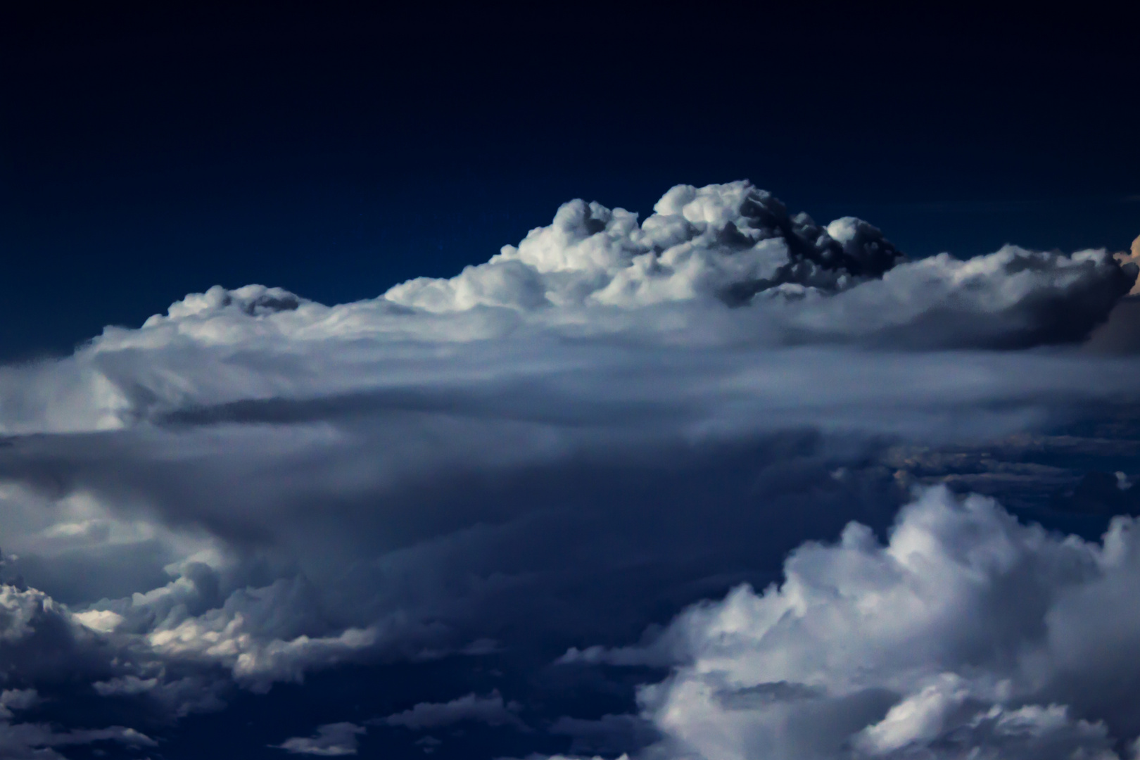 Stormcloud seen from a plane window