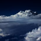 Stormcloud seen from a plane window