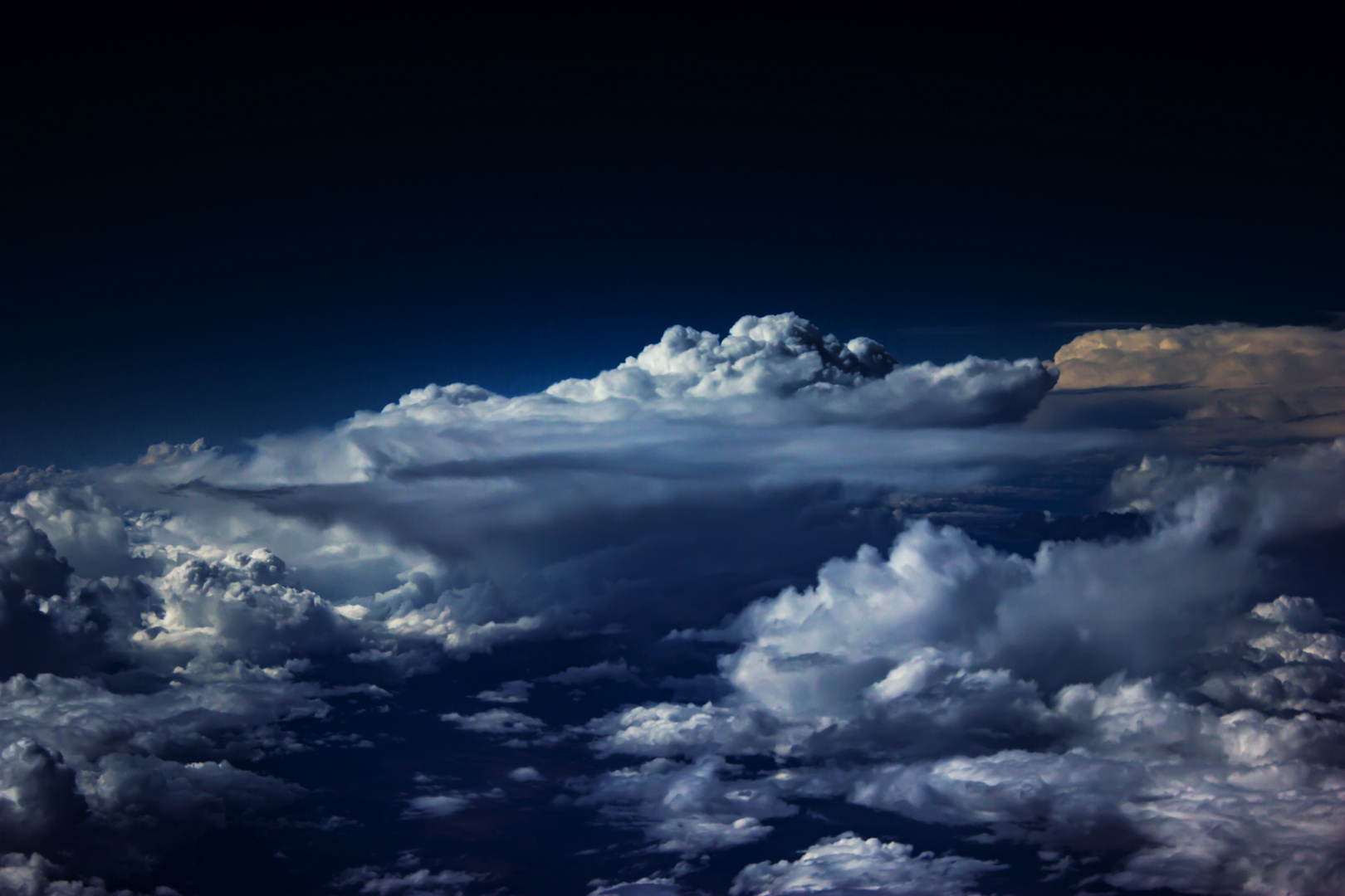 Stormcloud seen from a plane window