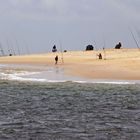 Strand mit Fischern