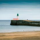 Strand mit Leuchtturm