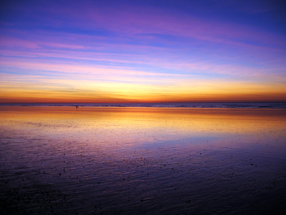 Strand während Sonnenuntergang