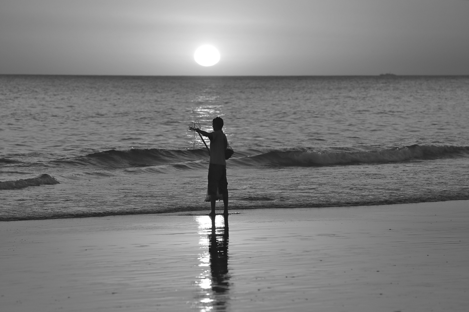 Strandfischer in der Abenddämmerung