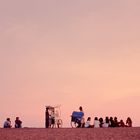 Strandleben bei Sonnenuntergang