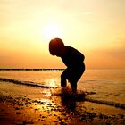 Strandspaß beim sonnenuntergang