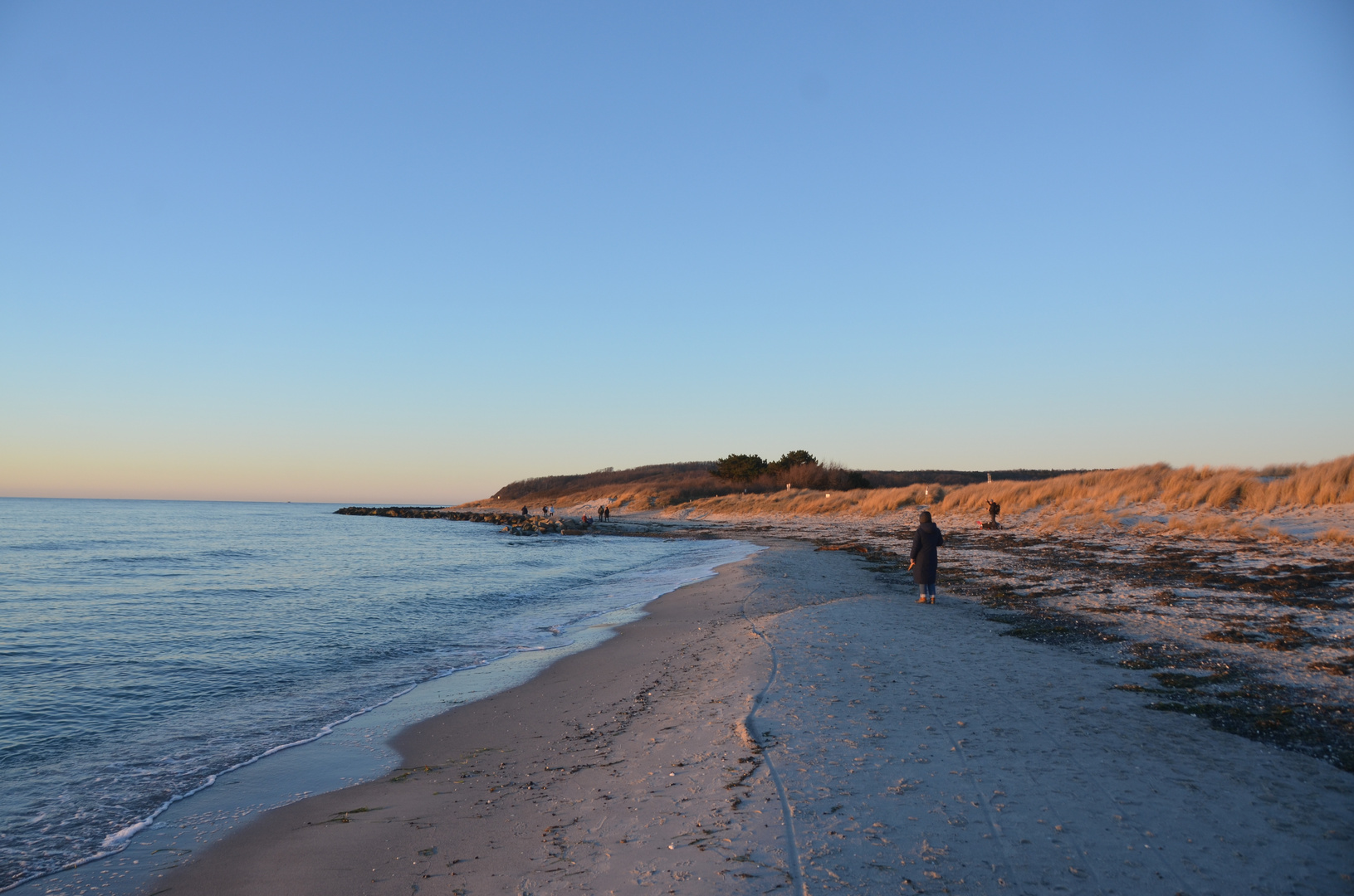 Strandspaziergang zum Sonnenuntergang 