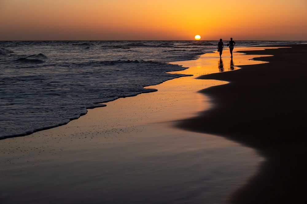 Strandspaziergang zum Sonnenuntergang 