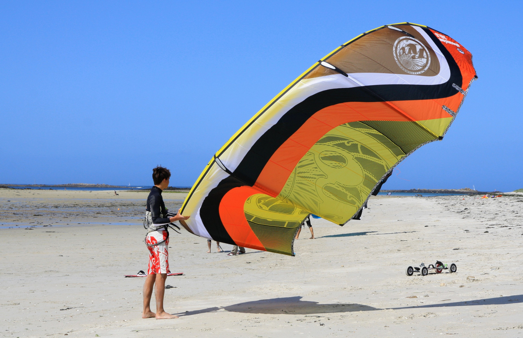 Strandszene mit Drachen