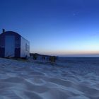 Strandwagen unter Abenhimmel