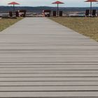 Strandweg Terra Nova Liegestühle Sonnenschirm Blick ins unglaublich große Loch