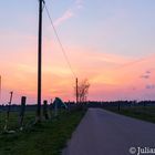 Straße nach Hause zum Sonnenuntergang 