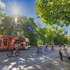 Straßenbahn und Radrennfahrer