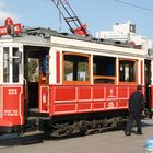 Straßenbahn und Wasserverkäufer