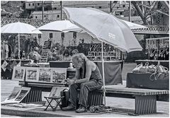 Straßenkünstler in Porto – gelangweilt