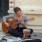 Straßenmusikantin in Lissabon