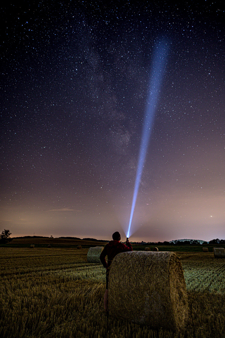 straw bales at night