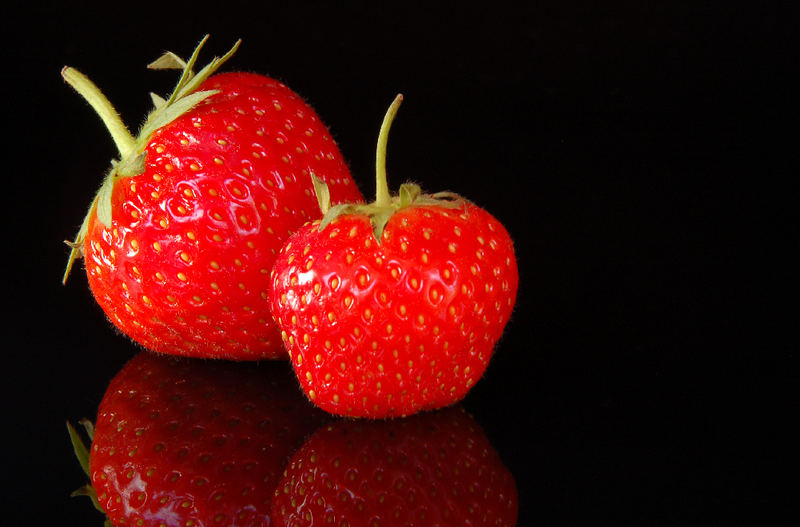 Strawberries on black