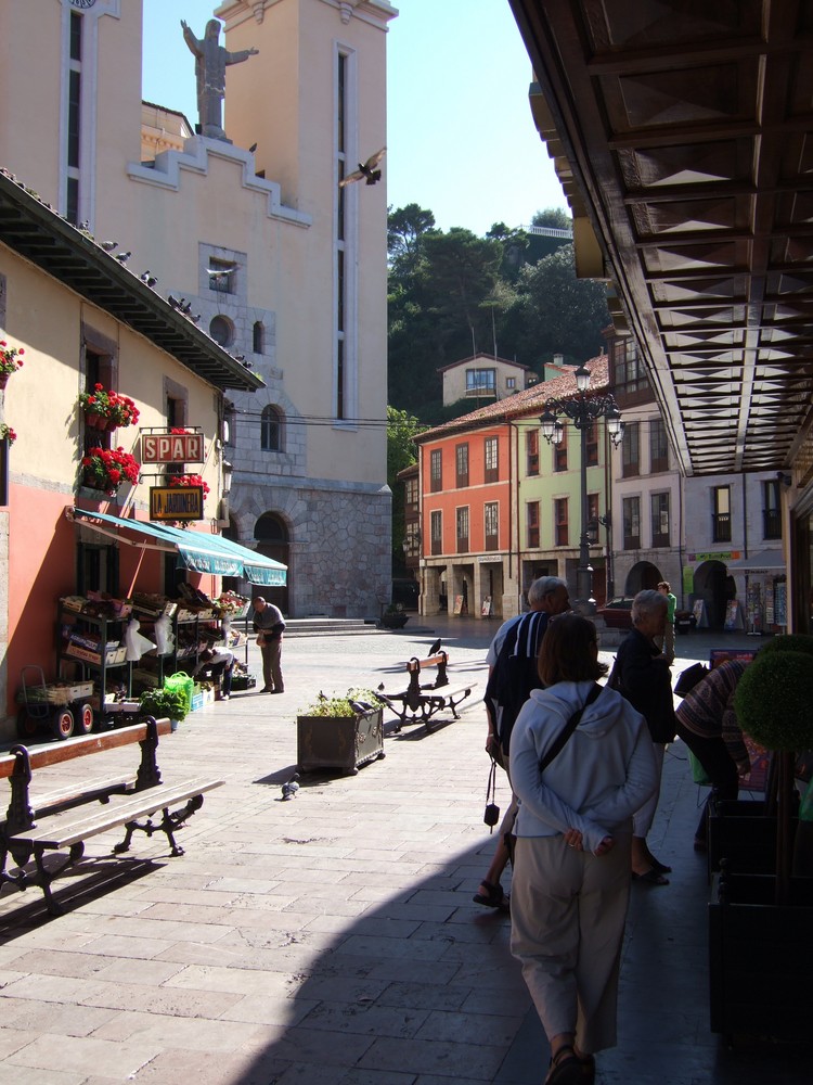 Street in Ribadesella with the church